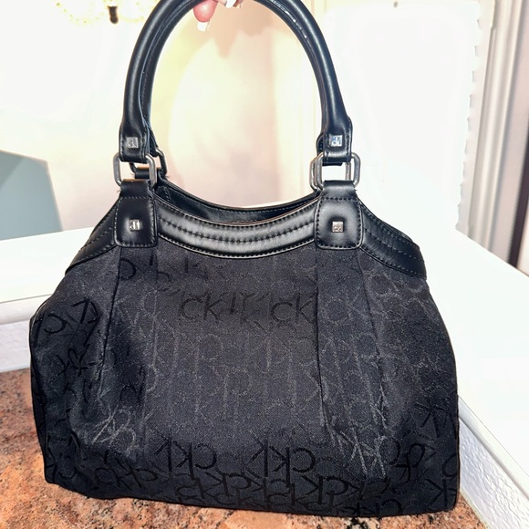 Calvin Klein Handbags - Calvin Klein canvas and leather satchel